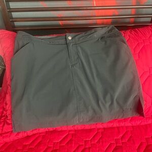 The North Face Skort. Size 10 with zipper & snap & drawstring waist. Black